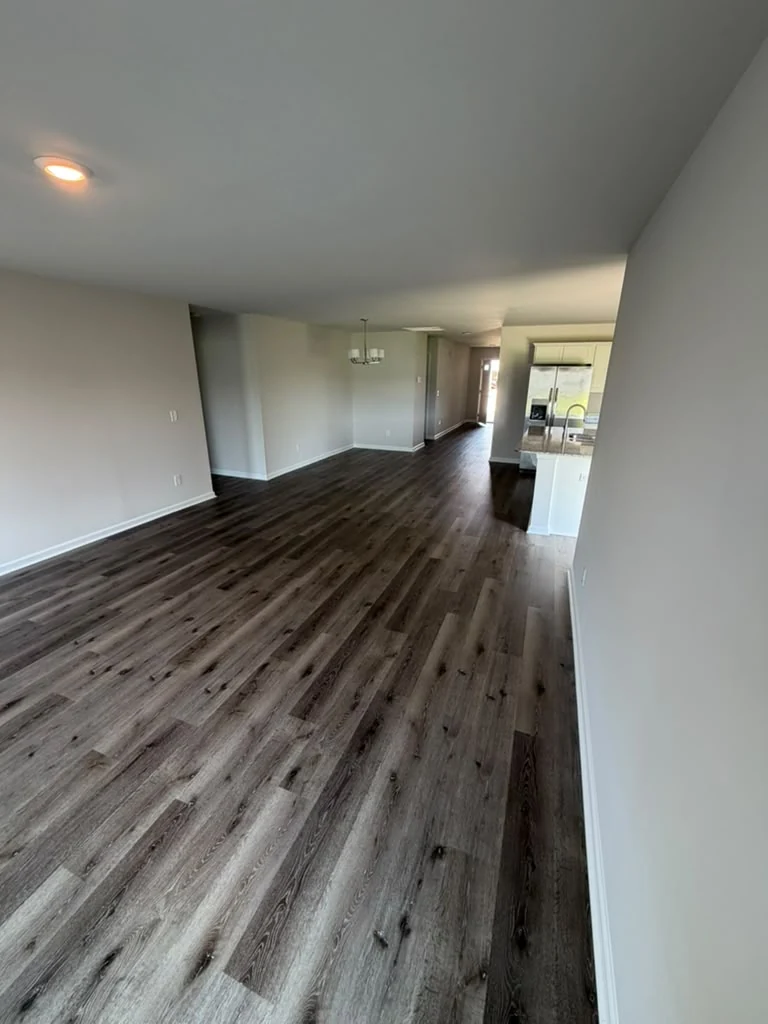 Dark Wood-Look Vinyl flooring project by Avelino Floorings