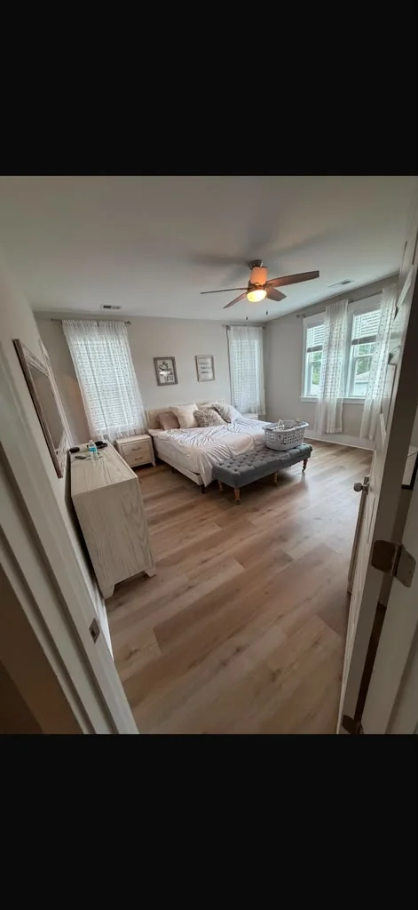 Light vinyl flooring in a bedroom